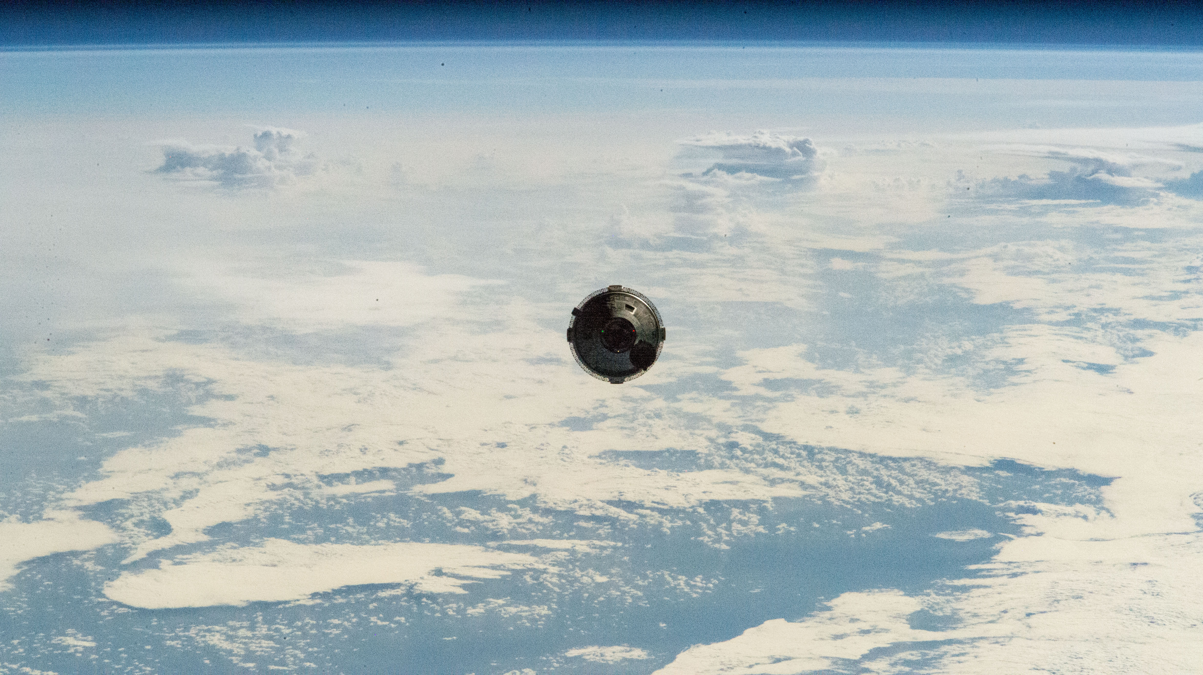 Boeing's Starliner spacecraft approaches the International Space Station during its 2024 crew flight test, photographed from the station on June 6, 2…