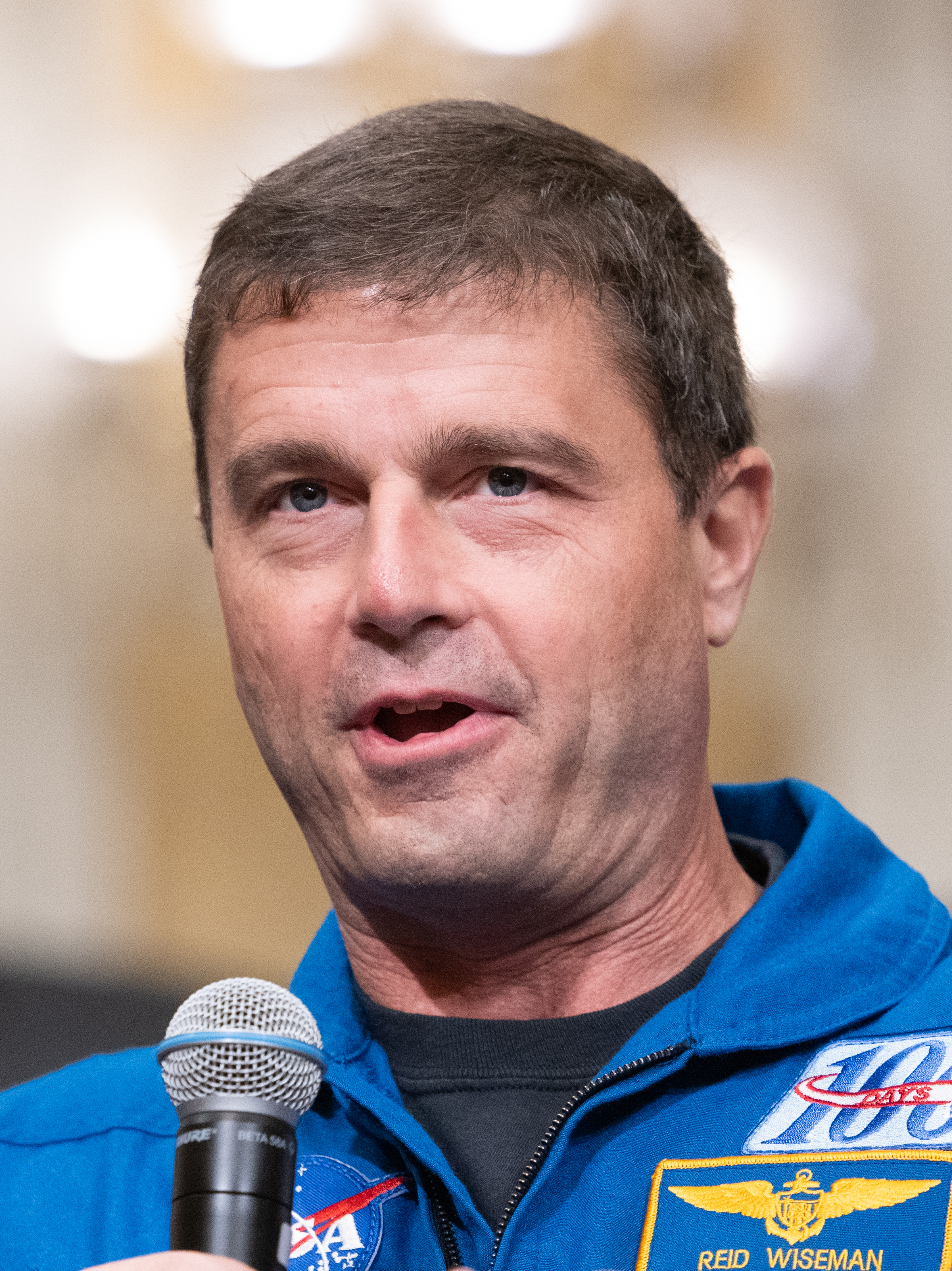 Artemis II commander Reid Wiseman speaks on Capitol Hill in Washington, May 12, 2026.