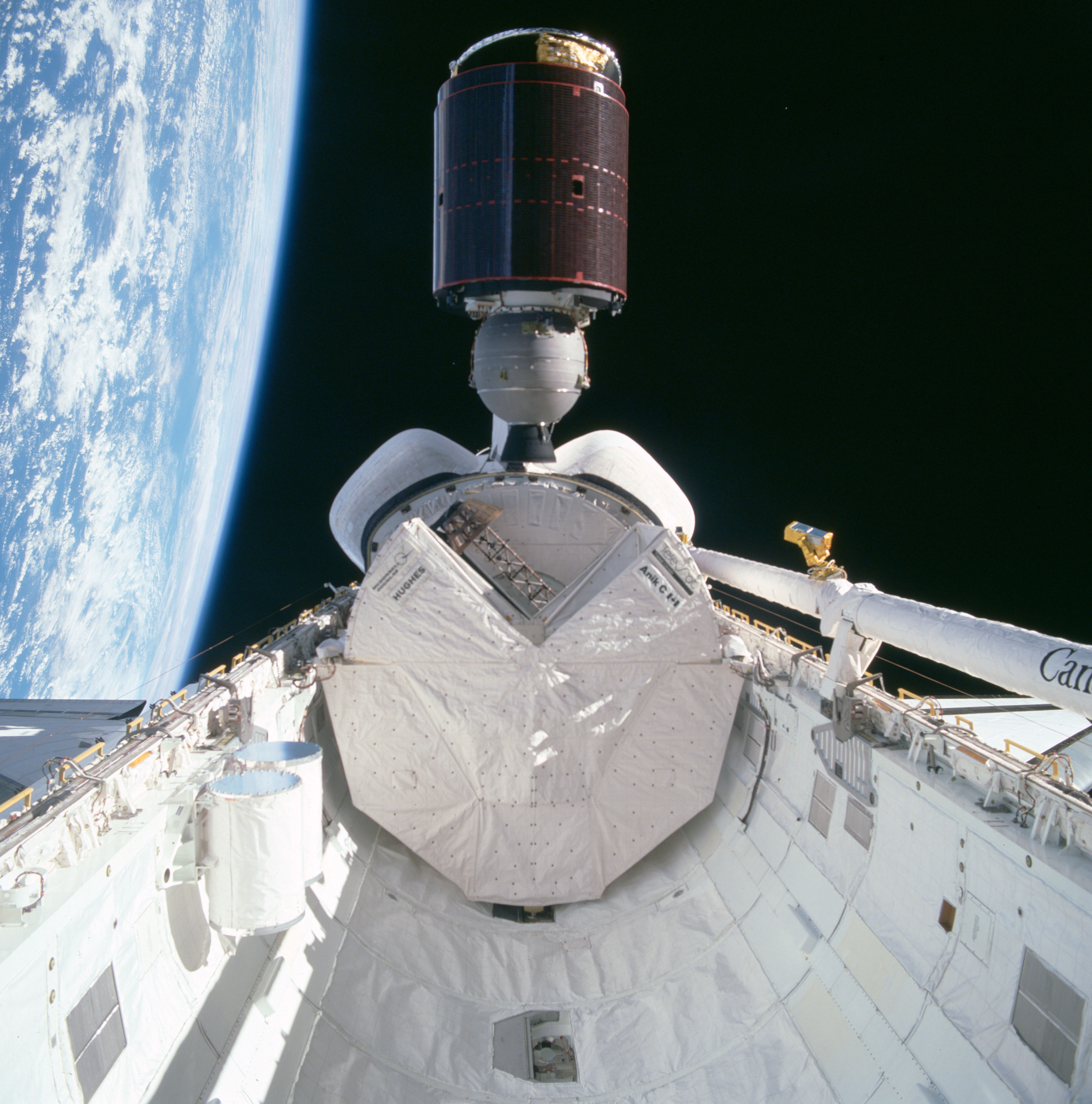 Telesat Canada's Anik C-1 communications satellite deploys from the Space Shuttle Discovery payload bay during STS-51-D in April 1985.