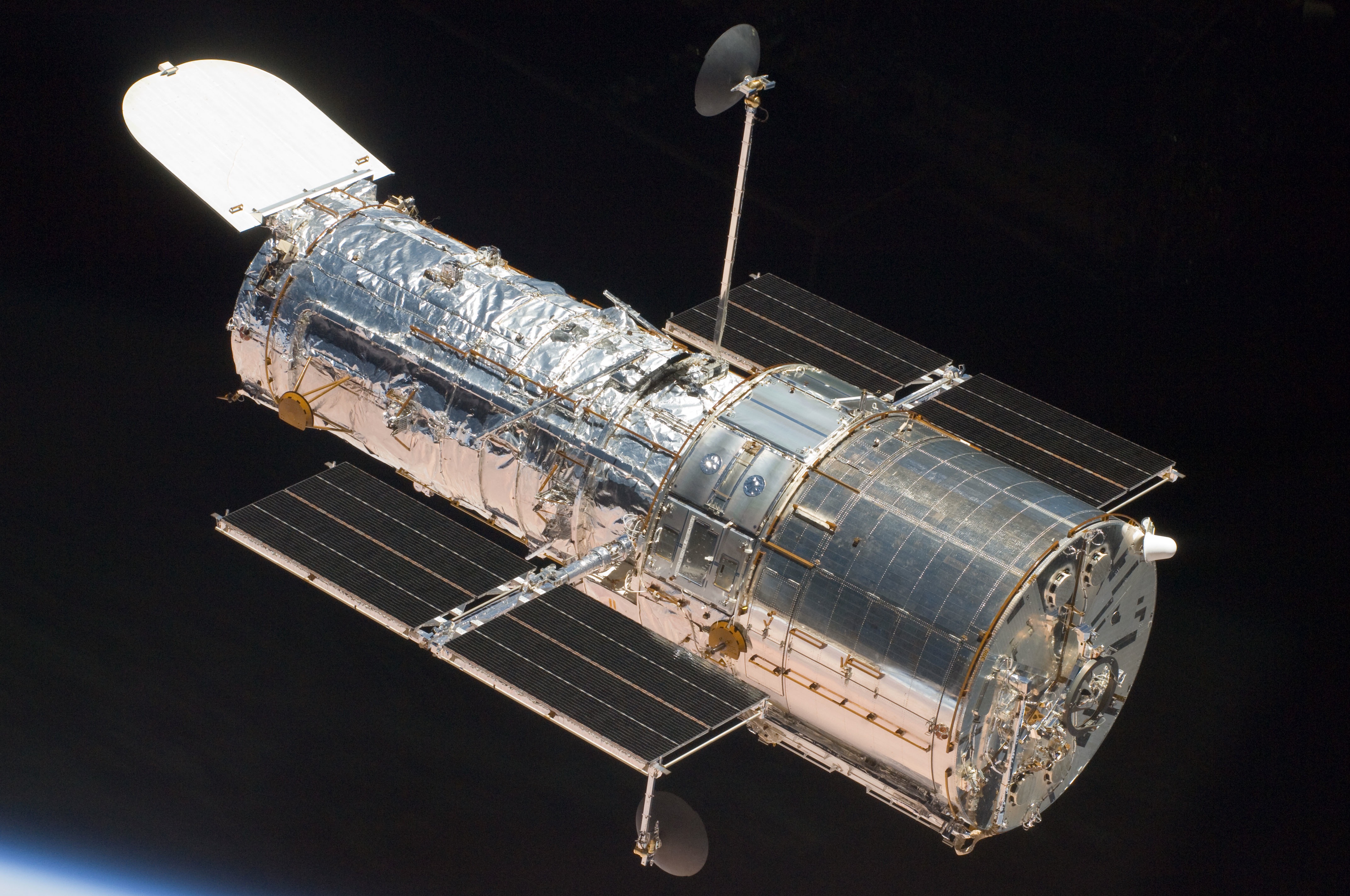 The Hubble Space Telescope floats in orbit after Space Shuttle Atlantis released it on May 19, 2009, at the end of Servicing Mission 4.